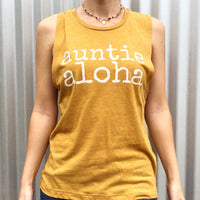 woman wearing a mustard yellow auntie aloha muscle tank with choker necklace